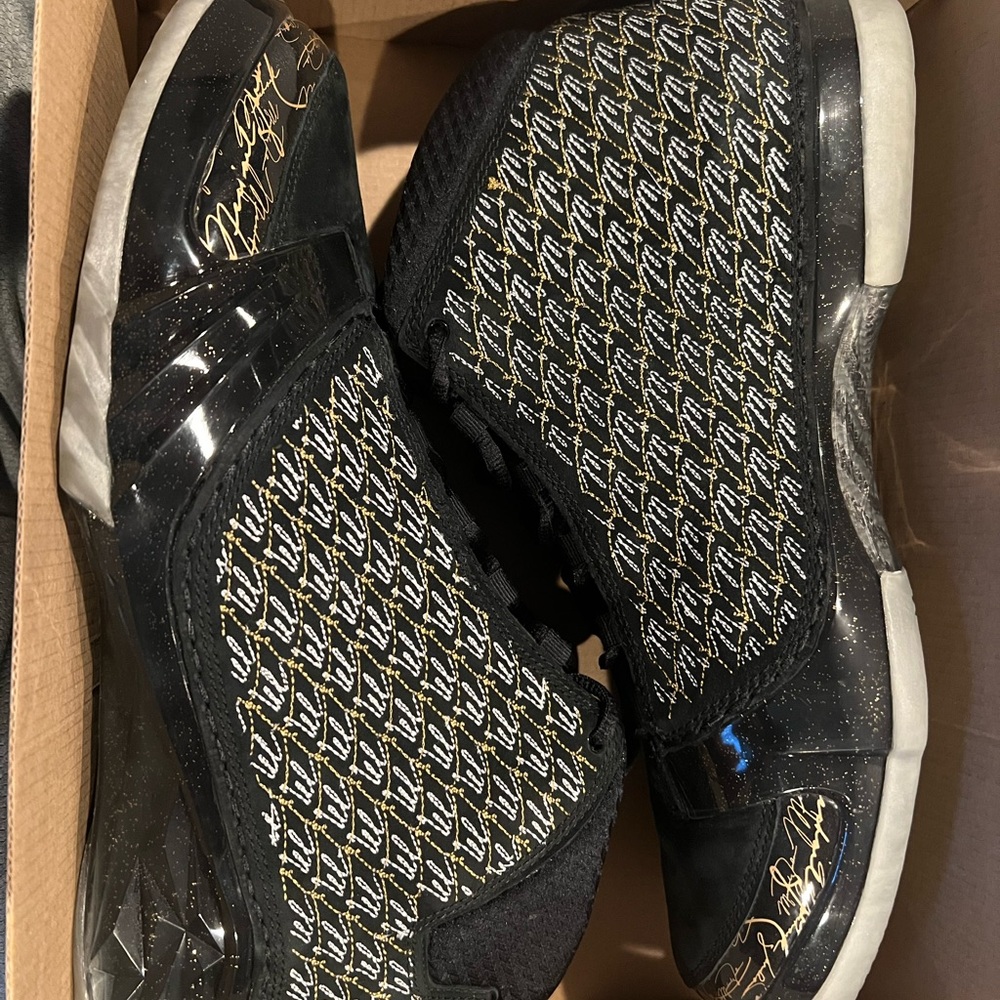 Jordan Black and Gold Signature Sneakers